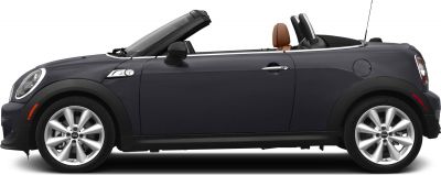 Side profile of a two-seater convertible with open roof and sporty alloy wheels.