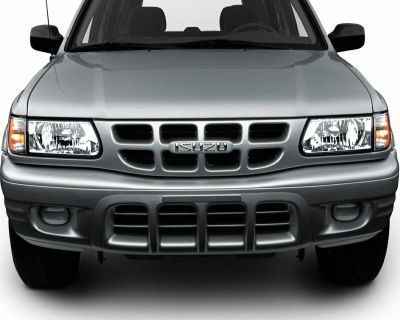 Front view with distinct grille and rectangular headlights with amber turn signals