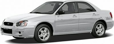 Side profile of a silver mid-2000s sedan with alloy wheels and refined design lines