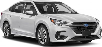 Front side view of a sedan with sleek headlights and alloy wheels