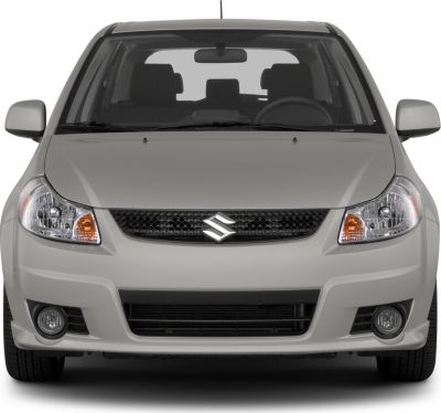 Front view with headlights, grille, and fog lights