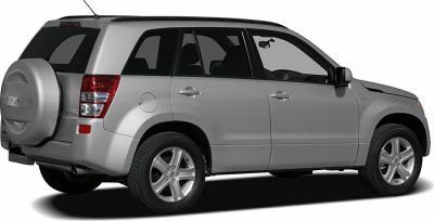 Rear and side view of an SUV with spare wheel cover and alloy wheels