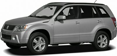 Silver mid-size SUV side profile with five doors and alloy wheels