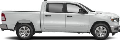 Side profile of double cab pickup with chrome wheels and white paint