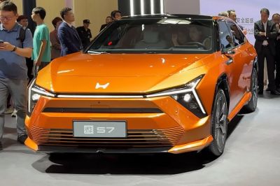 Futuristic front fascia with sharp LED headlights in vibrant orange