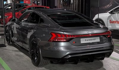 Rear view with sleek aerodynamic design and illuminated LED tail lights