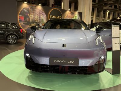Front view with modern LED headlights and smooth hood design