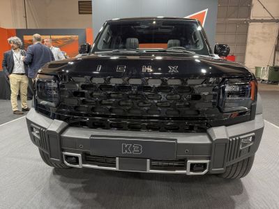 Bold front fascia with hexagonal patterned grille and integrated headlights