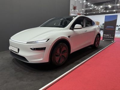 Sleek LED headlights paired with aerodynamic wheel covers of an electric SUV