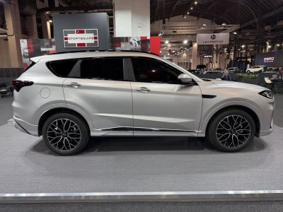 Sleek SUV side profile with distinctive alloy wheels