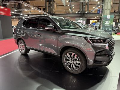 Modern LED headlights and chrome alloy wheels on a sleek SUV exterior