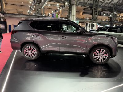 Side profile of SUV with chrome alloy wheels