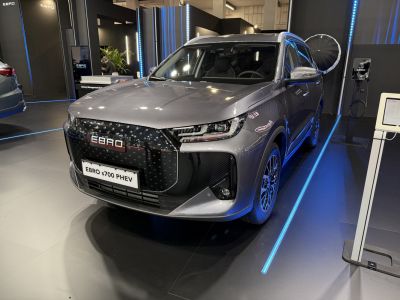 Modern front grille with LED headlights on hybrid SUV