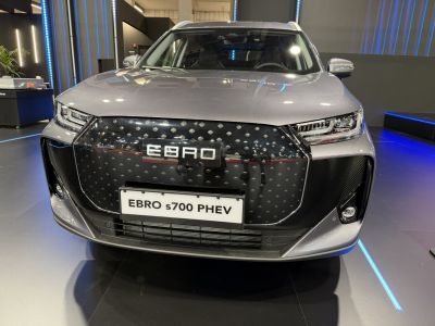 Modern front grille and sleek LED headlights of SUV