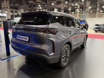 Rear side with LED taillights and charging port of electric SUV