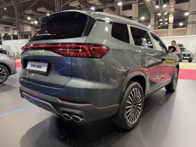 Modern SUV rear with LED taillights and quad exhaust tips