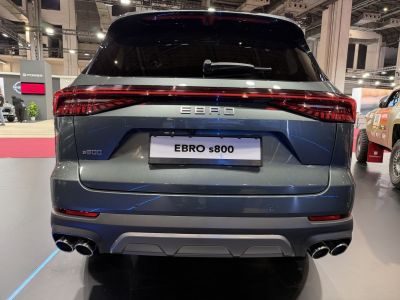 Rear view of SUV with quad exhaust tips and LED tail lights