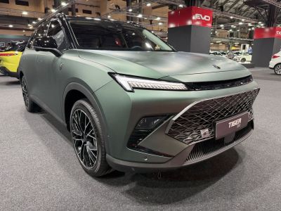 LED headlights and large front grille of SUV