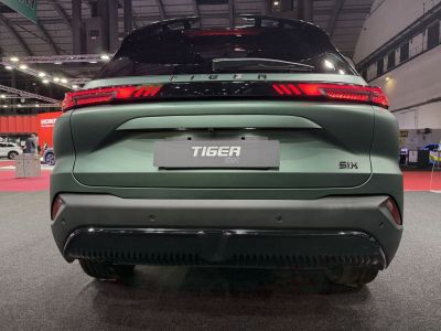 Rear end with LED tail lights and matte finish bumper.