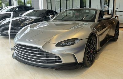 Front grille and sporty black wheels of luxury convertible