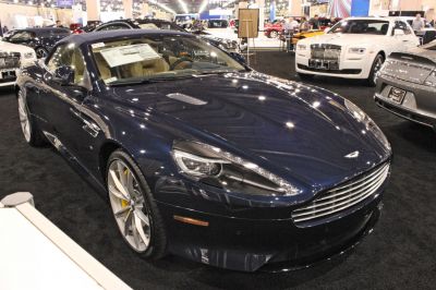 Front and side view of luxury convertible with distinctive grille and alloy wheels