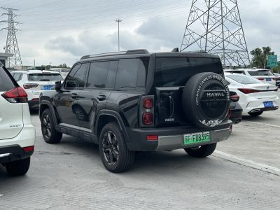 Black SUV with rear spare tire cover and dark tinted windows