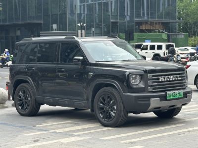 Black SUV with square LED headlights and bold grille