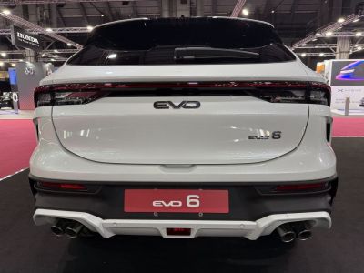 Rear view with quad exhaust and sleek connected taillights
