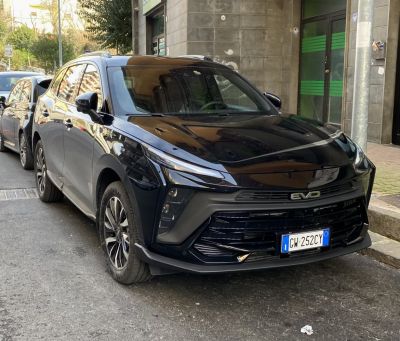 Modern front design with sleek headlights and bold grille