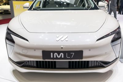 Sleek LED headlights with sharp contours and aerodynamic front grille vents