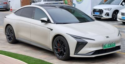 Sleek electric sedan with aerodynamic design and LED headlights