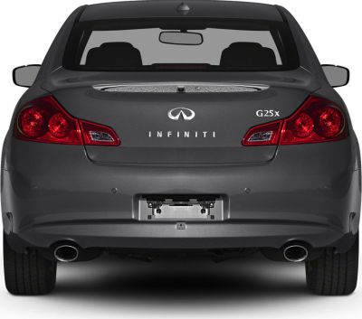 Rear view of sedan with dual exhaust and distinctive tail lights