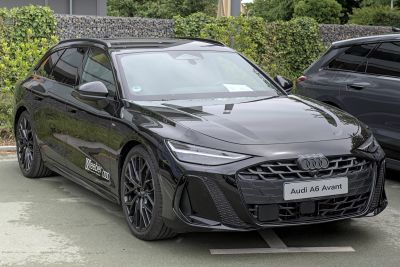 Glossy black wagon with sporty grille and LED headlights