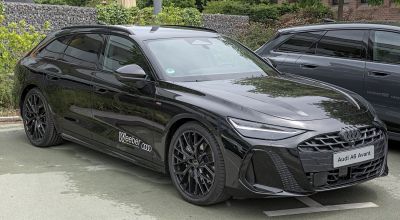 Black station wagon with sporty design and aggressive front grille