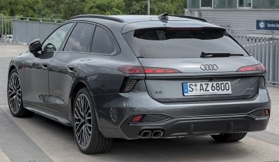 Station wagon rear with quad exhaust tips and sleek taillights