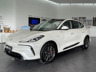 Aerodynamic front design with sporty alloy wheels on a white electric crossover