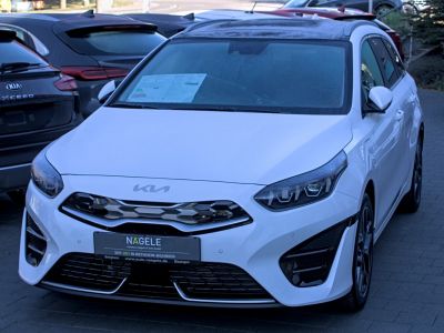 Front grille and LED headlights of a modern white car