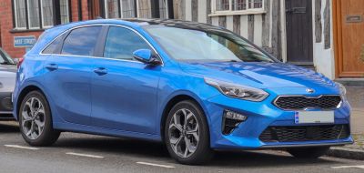 Blue compact hatchback with sporty alloy wheels