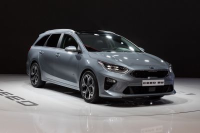 Front and side profile with headlights and alloy wheels