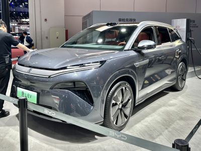 Front and side view of electric SUV with sleek body and aerodynamic wheels