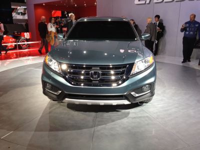Front view with LED headlights and chrome grille