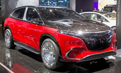 Electric luxury SUV with bold grille and futuristic design
