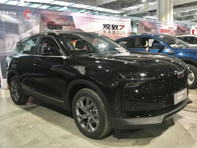 Black SUV shown from front three-quarter angle with alloy wheels