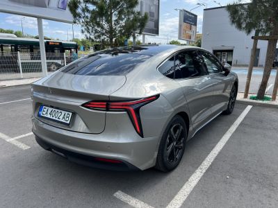 Modern rear view with distinctive LED taillights and aerodynamic lines