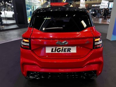 Rear view of red Ligier JS50 II with modern tail lights and compact design