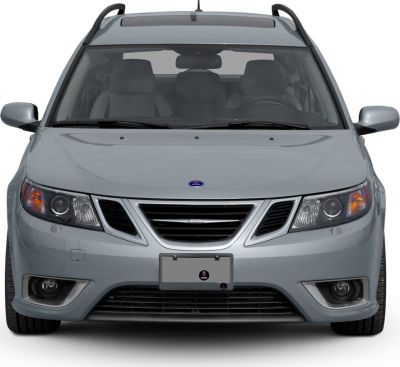 Front view showing grille, headlights, fog lights, and roof rails.