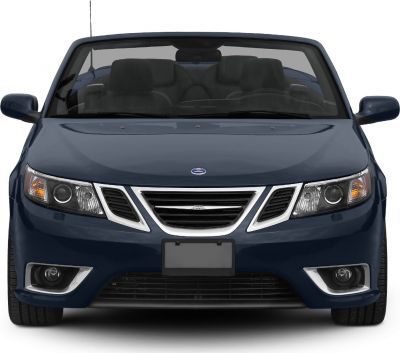 Front view of a convertible emphasizing headlights, grille, and fog lights.