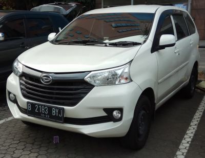Front and side profile of compact MPV with angular headlights and wide grille
