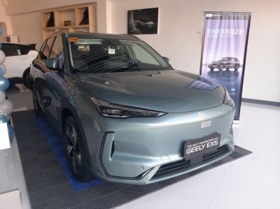 Sleek SUV front with sharp LED headlights and smooth body lines