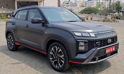 Bold front grille and sharp LED headlights with sporty alloy wheels